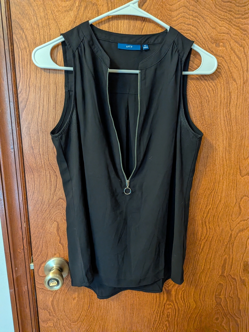 Black Sleeveless Zip-Front Blouse